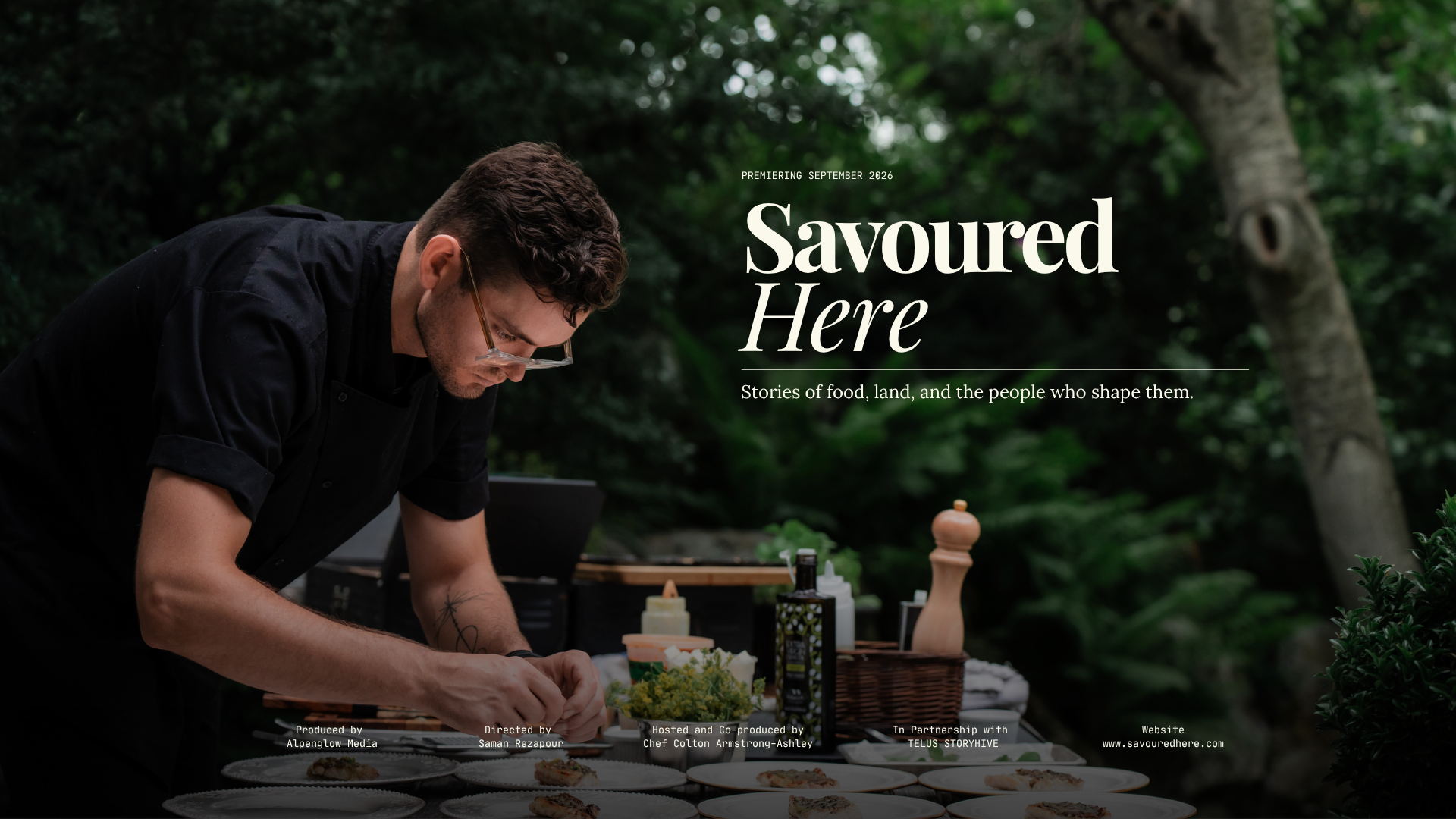 Chef Colton plating dishes outdoors — trailer still